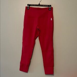 FP Movement by Free People red Leggings with weaving detail on legs